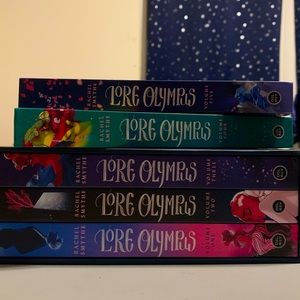 First 5 volumes of the hardcover Lore Olympus webtoon